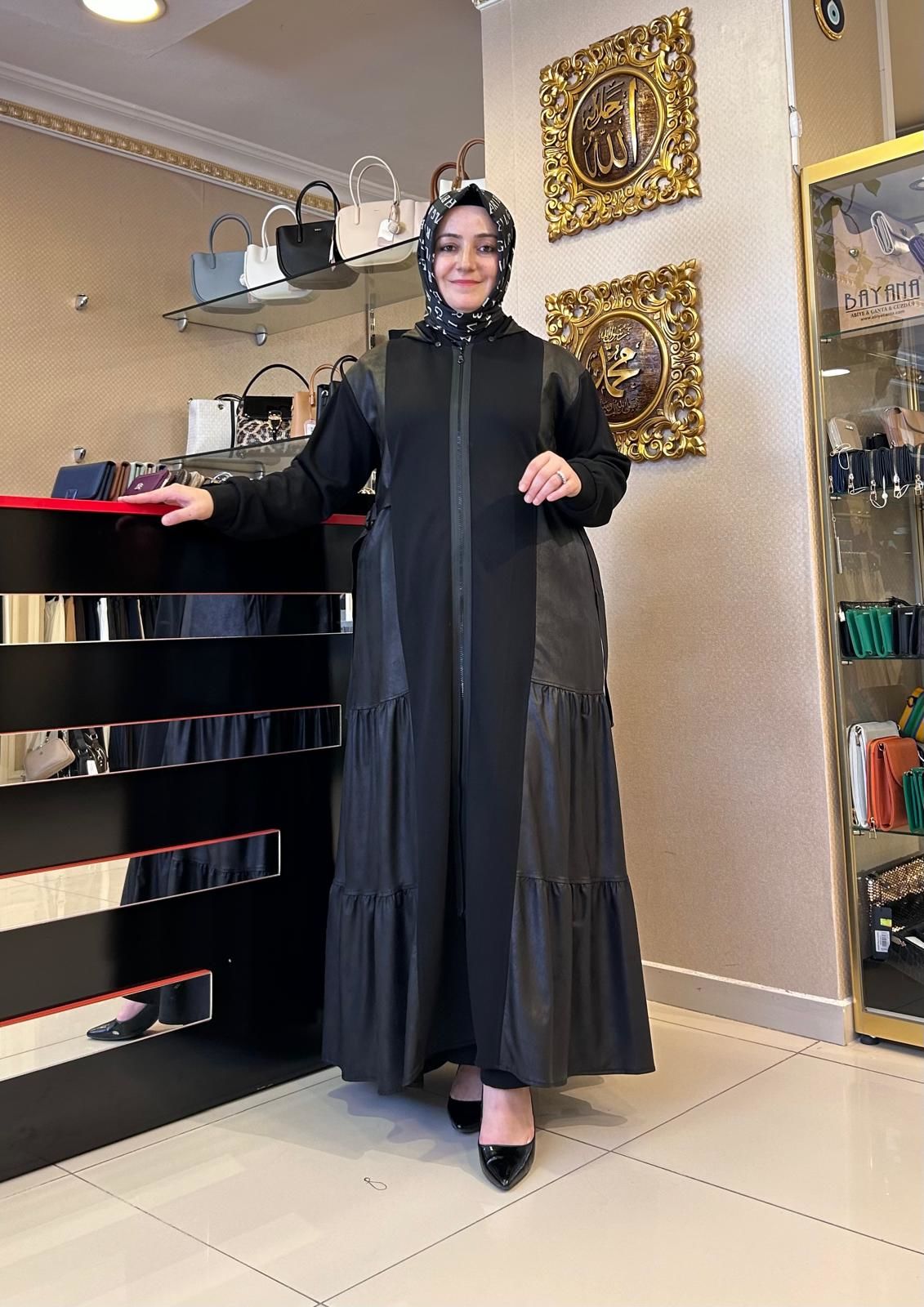 DERİ VE KUŞAK DTY. KAPÜŞONLU FERACE/NURCAN ÇETİN