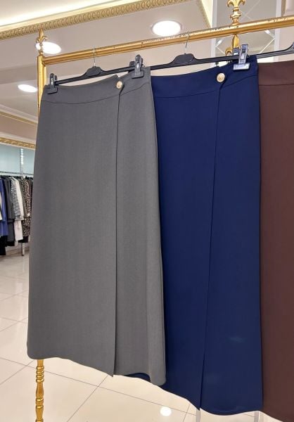 DÜĞME DTY. ÖNÜ KAPAMALI KREP ETEK/GLARE