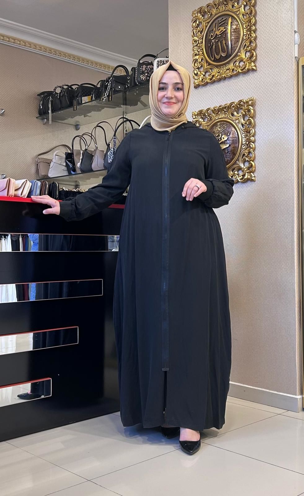 ﻿SİYAH ŞERİT DTY. TENSEL KUMAŞ FERACE/ NURCAN ÇETİN